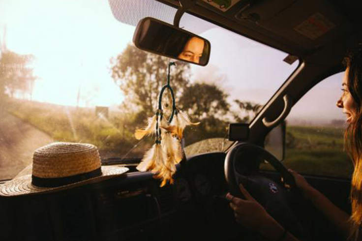 Girl driving a campervan