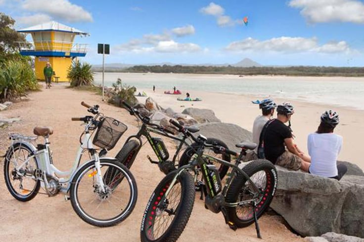 tourists visiting noosa on electric bikes with eco trek