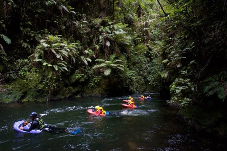 Friends floating down river