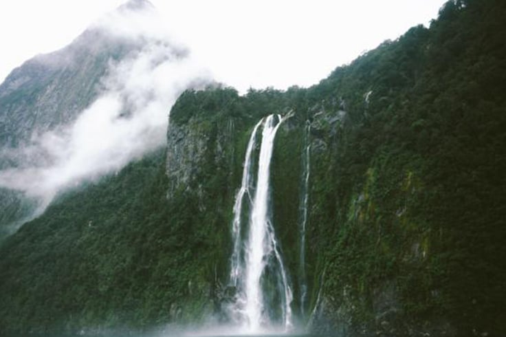dramatic and cloudy waterfall