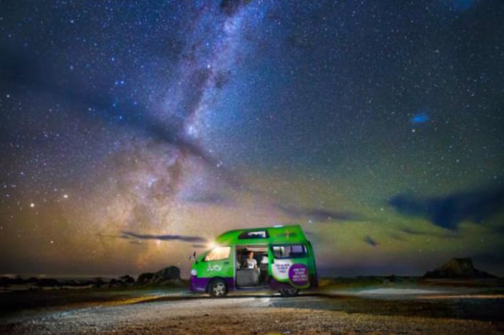 JUCY campervan under night sky South Island