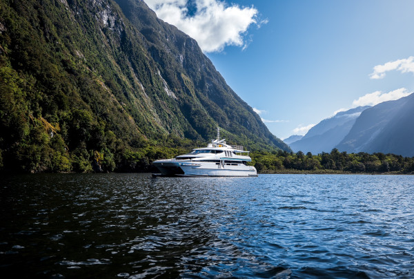 Boat exploring Milford Sound