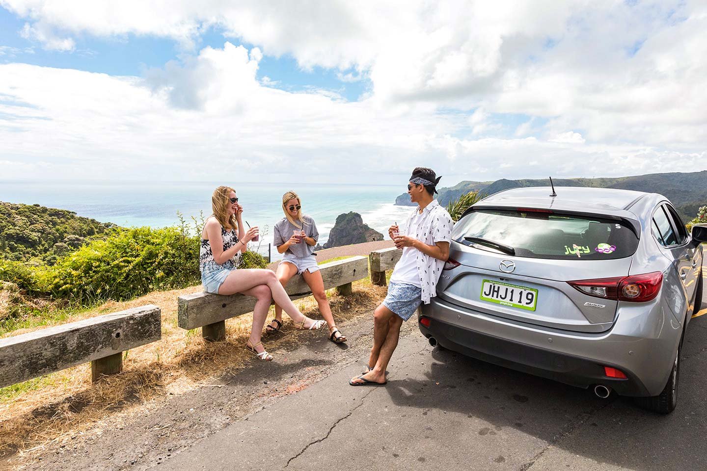 friends enjoy ice cream in piha mid hatch